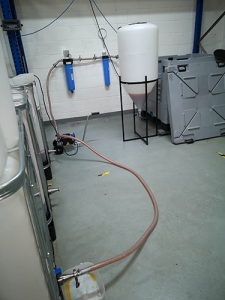 flexible impeller pump and a hose between tanks