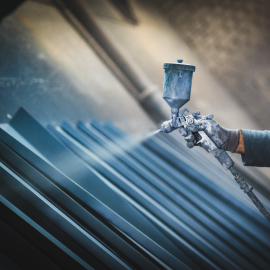 surface treater spray being sprayed